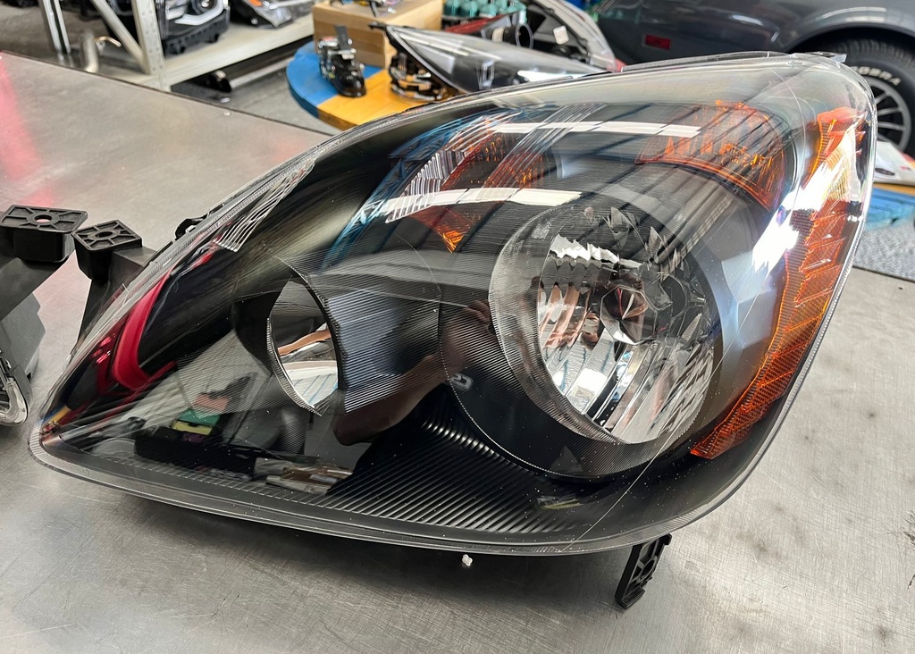 Par de Luces Delanteras/Carcasa Negra Honda CRV 05-06