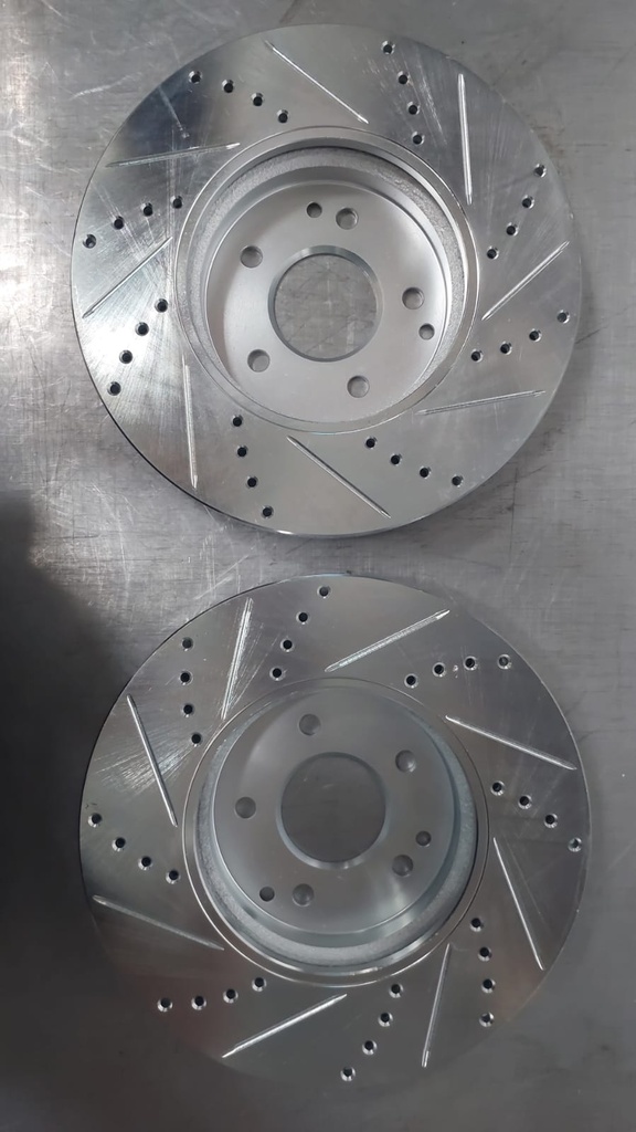 Discos delanteros perforados ventilados Premium Drilled and Slotted Vented Front Passenger Side Brake Rotor (631-63048R) by Dynamic Friction Company®. Quantity: 1 Per Pack. Premium G3000/G11H18 Iron Castings for Strength, Stability, and Durability. Each rotor passes a 100% electronic inspection station that measures over 20 attributes to ensure that each rotor meets OE specifications.  Video Gallery About us Specifications: Driving Style: Performance / Racing Rotor Design: Optional Design Full Cast Rotor Style: Drilled & Slotted Rotor Material: Cast Iron Rotor Finish: Silver Rotor Type: Vented Rotor Diameter: 300mm (11.81'') Rotor Height: 46.5mm (1.83'') Nominal Thickness: 28mm (1.1'') Minimum Thickness: 25.4mm (1'') Lug Holes Quantity: 5 Lug Holes Size: 13.2mm (0.52'') Bolt Circle: 112mm (4.41'') Hub Hole Diameter: 67mm (2.64'') Quantity: 1 Per Pack Features: Engineered with premium G3000/G11H18 iron castings for strength, stability, and durability Original Equipment (OE) vane configuration to ensure proper and maximum heat dissipation CNC-machined to the tightest tolerances 100% precision mill-balanced for smoother stopping and zero vibration at any speed Non-directional finish to promote faster break-in and smoother stops Designed to meet the same form, fit, and function as OEM brake rotors Quality tested to ensure long-lasting performance New in Box, Ready to Install, No Modifications Required DFC Premium Performance Brake Rotors are engineered for performance at a great value. Performance rotors will grab more bite to the brake pads giving you shorter stopping distance especially in wet weather. Formulated with the G3000/G11H18 cast iron specification, DFC G3000/G11H18 Brake rotors are engineered to match OEM specifications for durability, reliability, and stability. Each rotor casting is sent to our state of the art machining facilities, where it is processed to the tightest tolerances available in the market today. Then, the rotor is prepared with a non-directional finish to promote a faster and more even brake pad bed-in, along with quieter and smoother stops. Finally, all vented rotors are 100% inspected for balance and are corrected if necessary with our state of the art electronic mill-balance process. After all of the machining processes are completed, each rotor passes a 100% inspection station that measures all critical attributes to ensure that each rotor meets OE specifications. This further guarantees that each and every rotor delivered to you is trouble free.  Dynamic Friction Company® is committed to bringing innovation and value to the automotive aftermarket by manufacturing OE-quality brake products. Striving to meet the most diverse customer needs, the company maintains a massive inventory of brake parts for all domestic and foreign vehicle applications from the 1930s to the present. From OE replacement and performance brake rotors to passenger, heavy-duty, and high-performance brake pads to brake calipers and shoes to hardware kits and much more, DFC has everything you need to keep your brake system performing at its best. The company makes all its products from the finest materials using cutting-edge manufacturing technologies to ensure superior durability, strength, and long-lasting performance.  California Residents  WARNING Cancer and Reproductive Harm.   www.p65warnings.ca.gov  Brand:Dynamic Friction Company Part Number:631-63048R UPC:190920224270 Alternate MPN:63163048R Warranty 12 months/12,000 Miles Limited Warranty.  Magnuson-Moss Warranty Act:Legally, a vehicle manufacturer cannot void the warranty on a vehicle due to an aftermarket part unless they can prove that the aftermarket part caused or contributed to the failure in the vehicle (per the Magnuson Moss Warranty Act (15 U.S.C. 2302(C)) Learn More Related Links Parts Brakes Brake Rotors Vehicle Fitment Chrysler Crossfire 2004-2008