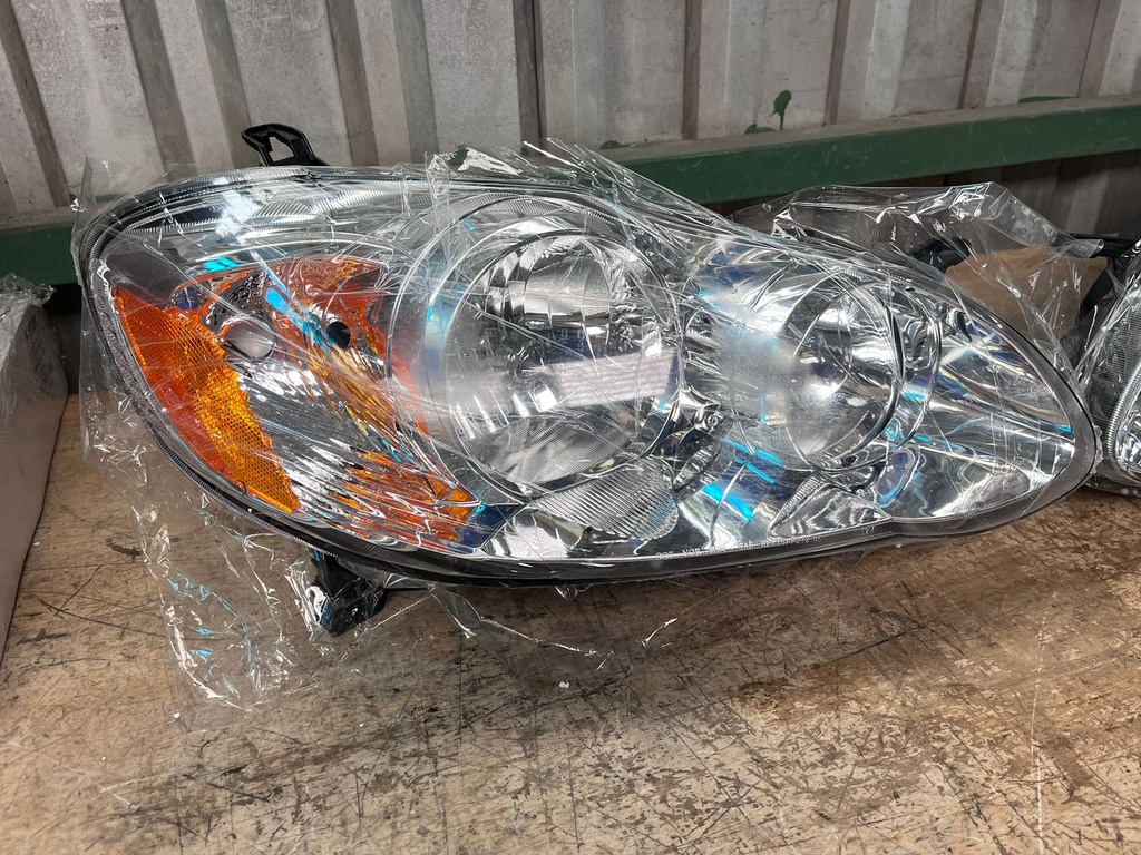 Luces Delanteras Cromadas Toyota Corolla 2003-2008.