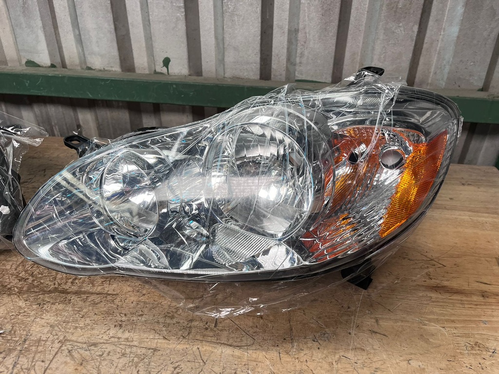 Luces Delanteras Cromadas Toyota Corolla 2003-2008.