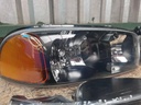 Juego de Luces Delanteras Carcasa Negra GMC Sierra 1500 / 2500 / 3500 1999-2006 / GMC Yukon 1500 / 2500 2000-2006.