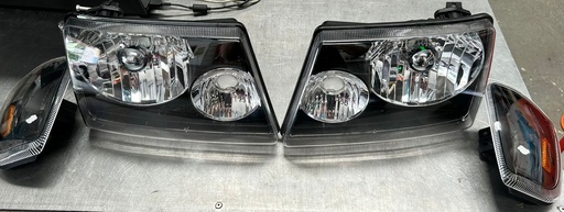 LUCES DELANT CARCASA NEGRA FORD RANGER 01/11 VERSION AMERICANA