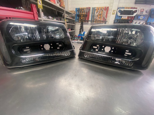 Luces Delanteras Carcasa Negra Chevrolet Trail Blazer 02/09