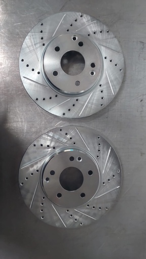 Discos delanteros perforados ventilados Premium Drilled and Slotted Vented Front Passenger Side Brake Rotor (631-63048R) by Dynamic Friction Company®. Quantity: 1 Per Pack. Premium G3000/G11H18 Iron Castings for Strength, Stability, and Durability. Each rotor passes a 100% electronic inspection station that measures over 20 attributes to ensure that each rotor meets OE specifications.  Video Gallery About us Specifications: Driving Style: Performance / Racing Rotor Design: Optional Design Full Cast Rotor Style: Drilled & Slotted Rotor Material: Cast Iron Rotor Finish: Silver Rotor Type: Vented Rotor Diameter: 300mm (11.81'') Rotor Height: 46.5mm (1.83'') Nominal Thickness: 28mm (1.1'') Minimum Thickness: 25.4mm (1'') Lug Holes Quantity: 5 Lug Holes Size: 13.2mm (0.52'') Bolt Circle: 112mm (4.41'') Hub Hole Diameter: 67mm (2.64'') Quantity: 1 Per Pack Features: Engineered with premium G3000/G11H18 iron castings for strength, stability, and durability Original Equipment (OE) vane configuration to ensure proper and maximum heat dissipation CNC-machined to the tightest tolerances 100% precision mill-balanced for smoother stopping and zero vibration at any speed Non-directional finish to promote faster break-in and smoother stops Designed to meet the same form, fit, and function as OEM brake rotors Quality tested to ensure long-lasting performance New in Box, Ready to Install, No Modifications Required DFC Premium Performance Brake Rotors are engineered for performance at a great value. Performance rotors will grab more bite to the brake pads giving you shorter stopping distance especially in wet weather. Formulated with the G3000/G11H18 cast iron specification, DFC G3000/G11H18 Brake rotors are engineered to match OEM specifications for durability, reliability, and stability. Each rotor casting is sent to our state of the art machining facilities, where it is processed to the tightest tolerances available in the market today. Then, the rotor is prepared with a non-directional finish to promote a faster and more even brake pad bed-in, along with quieter and smoother stops. Finally, all vented rotors are 100% inspected for balance and are corrected if necessary with our state of the art electronic mill-balance process. After all of the machining processes are completed, each rotor passes a 100% inspection station that measures all critical attributes to ensure that each rotor meets OE specifications. This further guarantees that each and every rotor delivered to you is trouble free.  Dynamic Friction Company® is committed to bringing innovation and value to the automotive aftermarket by manufacturing OE-quality brake products. Striving to meet the most diverse customer needs, the company maintains a massive inventory of brake parts for all domestic and foreign vehicle applications from the 1930s to the present. From OE replacement and performance brake rotors to passenger, heavy-duty, and high-performance brake pads to brake calipers and shoes to hardware kits and much more, DFC has everything you need to keep your brake system performing at its best. The company makes all its products from the finest materials using cutting-edge manufacturing technologies to ensure superior durability, strength, and long-lasting performance.  California Residents  WARNING Cancer and Reproductive Harm.   www.p65warnings.ca.gov  Brand:Dynamic Friction Company Part Number:631-63048R UPC:190920224270 Alternate MPN:63163048R Warranty 12 months/12,000 Miles Limited Warranty.  Magnuson-Moss Warranty Act:Legally, a vehicle manufacturer cannot void the warranty on a vehicle due to an aftermarket part unless they can prove that the aftermarket part caused or contributed to the failure in the vehicle (per the Magnuson Moss Warranty Act (15 U.S.C. 2302(C)) Learn More Related Links Parts Brakes Brake Rotors Vehicle Fitment Chrysler Crossfire 2004-2008